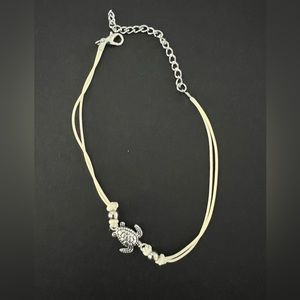 138 Beach Themed Anklet featuring Cream Cord w/ a Silver-toned Sea Turtle Charm